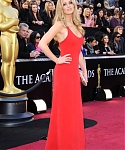 Jennifer_Lawrence_attending_the_2011_Academy_Awards_in_a_smoking_hot_red_dress_MQ_72.jpg