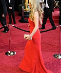 Jennifer_Lawrence_attending_the_2011_Academy_Awards_in_a_smoking_hot_red_dress_MQ_79.jpg