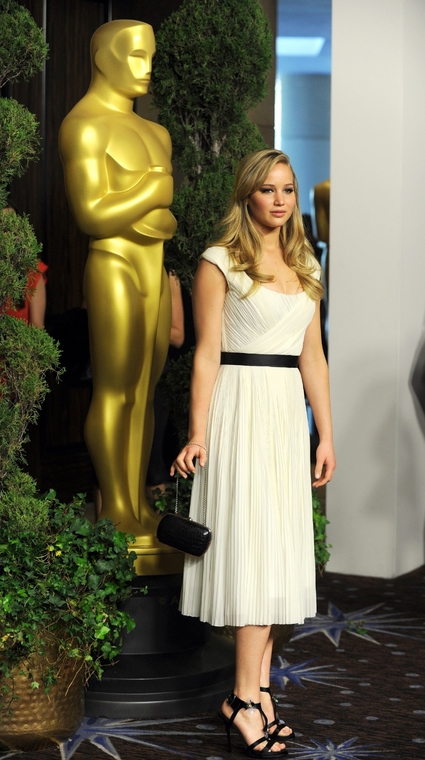 Jennifer_Lawrence_at_the_83rd_Academy_Awards_Nominations_in_a_beautiful_white_dress_02.jpg