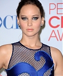 Jennifer_Lawrence_attending_the_2012_Peoples_Choice_Awards_in_a_sexy_see_through_blue_lace_dress_040.jpg