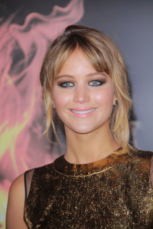 Jennifer_Lawrence_at_the_LA_premiere_of_The_Hunger_Games_begging_for_an_Oscar_in_a_gold_dress_109.jpg