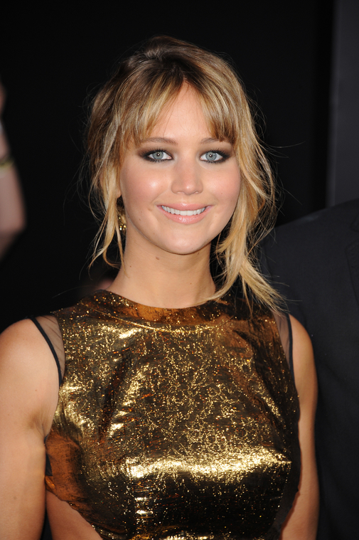 Jennifer_Lawrence_at_the_LA_premiere_of_The_Hunger_Games_begging_for_an_Oscar_in_a_gold_dress_165.jpg