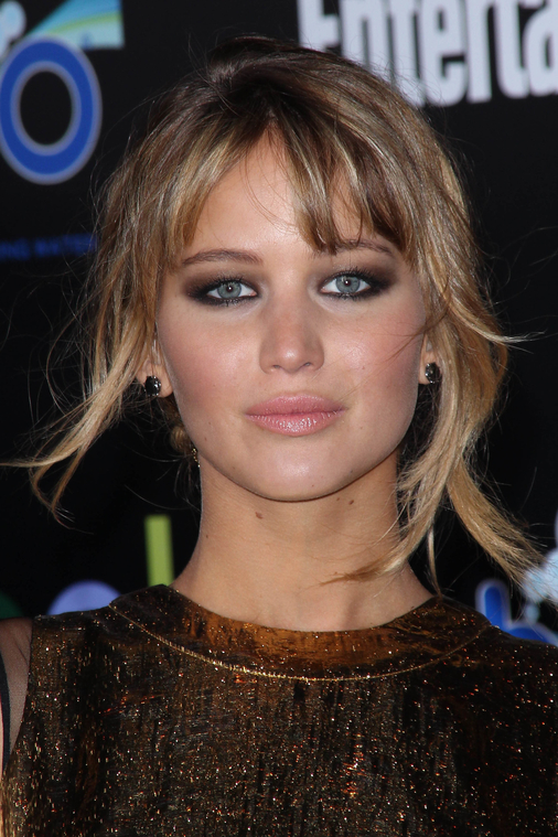 Jennifer_Lawrence_at_the_LA_premiere_of_The_Hunger_Games_begging_for_an_Oscar_in_a_gold_dress_176.jpg