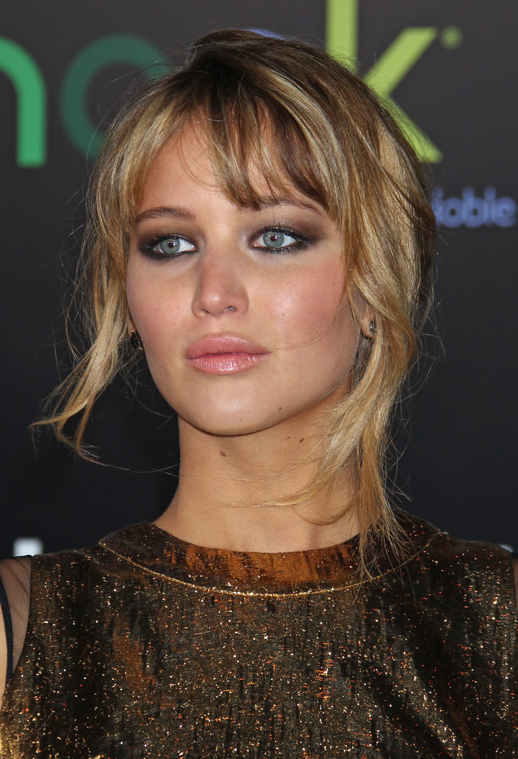 Jennifer_Lawrence_at_the_LA_premiere_of_The_Hunger_Games_begging_for_an_Oscar_in_a_gold_dress_228.jpg