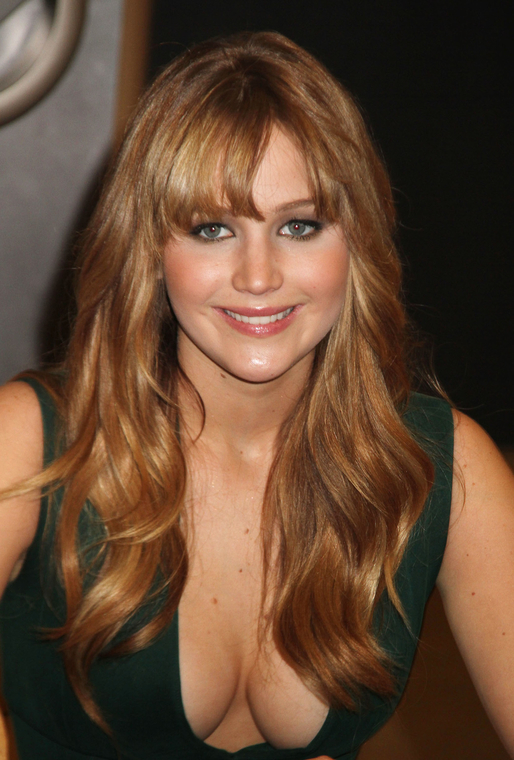 Jennifer_Lawrence_wearing_a_cute_low_cut_green_dress_at_a_book_signing_for_The_Hunger_Games_47.jpg