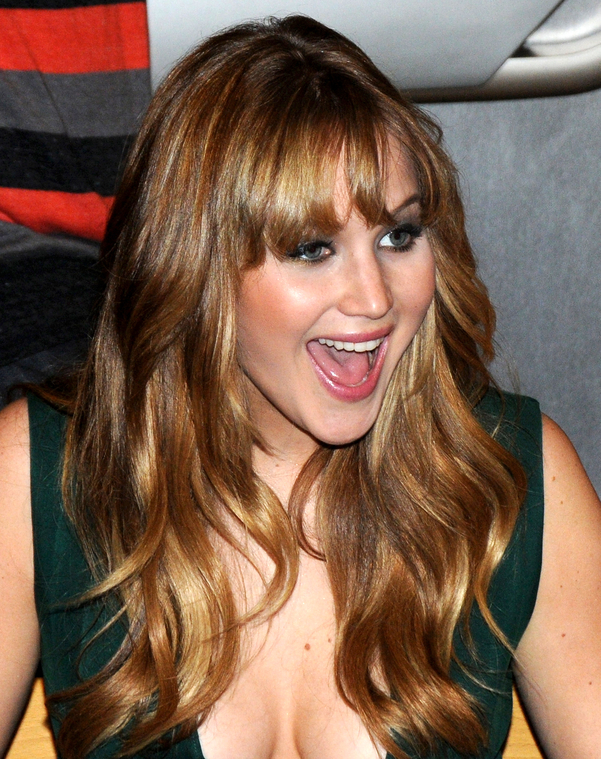 Jennifer_Lawrence_wearing_a_cute_low_cut_green_dress_at_a_book_signing_for_The_Hunger_Games_50.jpg