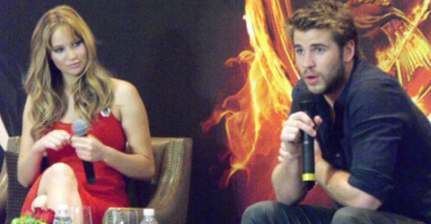 Jennifer Lawrence wearing a sexy HOT red dress very similar to the famous one she wore to the 2011 Oscars. 
