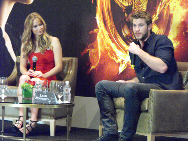 Jennifer Lawrence wearing a sexy HOT red dress very similar to the famous one she wore to the 2011 Oscars. 
