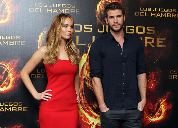 Jennifer Lawrence wearing a sexy HOT red dress very similar to the famous one she wore to the 2011 Oscars. 
