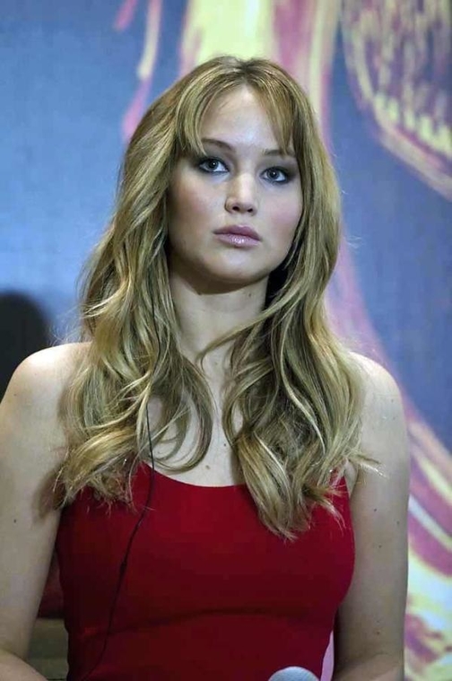 Jennifer Lawrence wearing a sexy HOT red dress very similar to the famous one she wore to the 2011 Oscars. 
