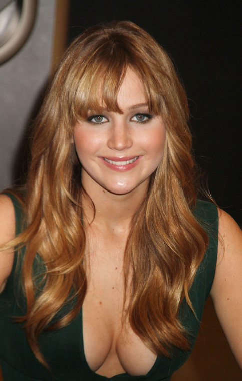 Jennifer_Lawrence_wearing_a_cute_low_cut_green_dress_at_a_book_signing_for_The_Hunger_Games_04.jpg
